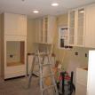 Wk 5 - Day 3 - Cabinets Being Installed.